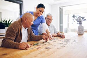 Puzzle, caregiver and senior men 